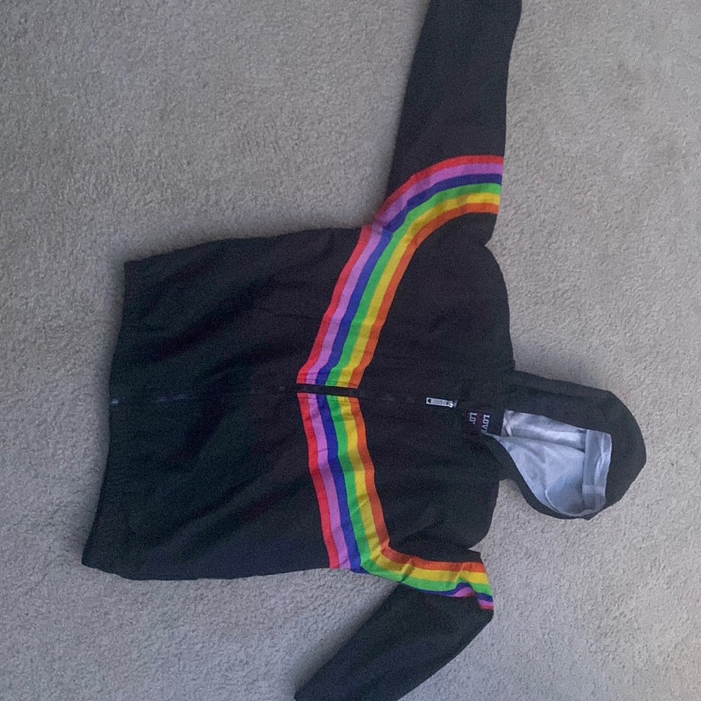 I'm selling a rainbow windbreaker and its a size XL.